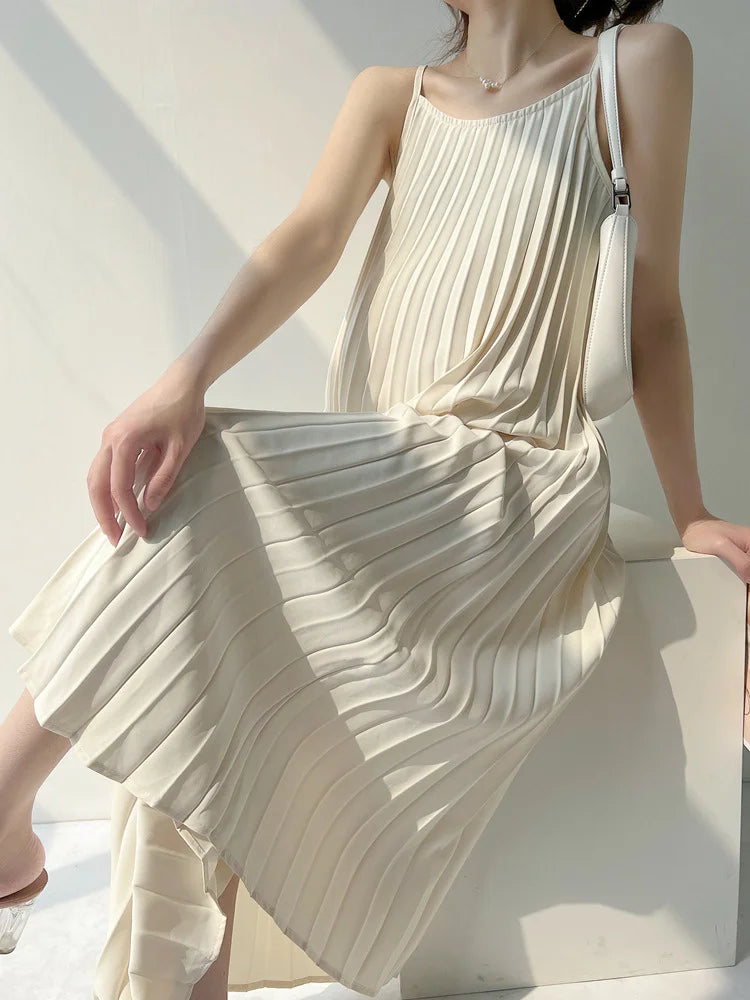 Pleated chiffon maternity dress in natural color, mid-calf length, perfect for summer wear.