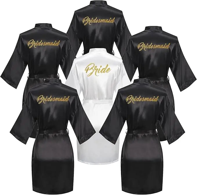 6-piece satin robe set featuring 'Bride' and 'Bridesmaid' designs in elegant black and white fabric.