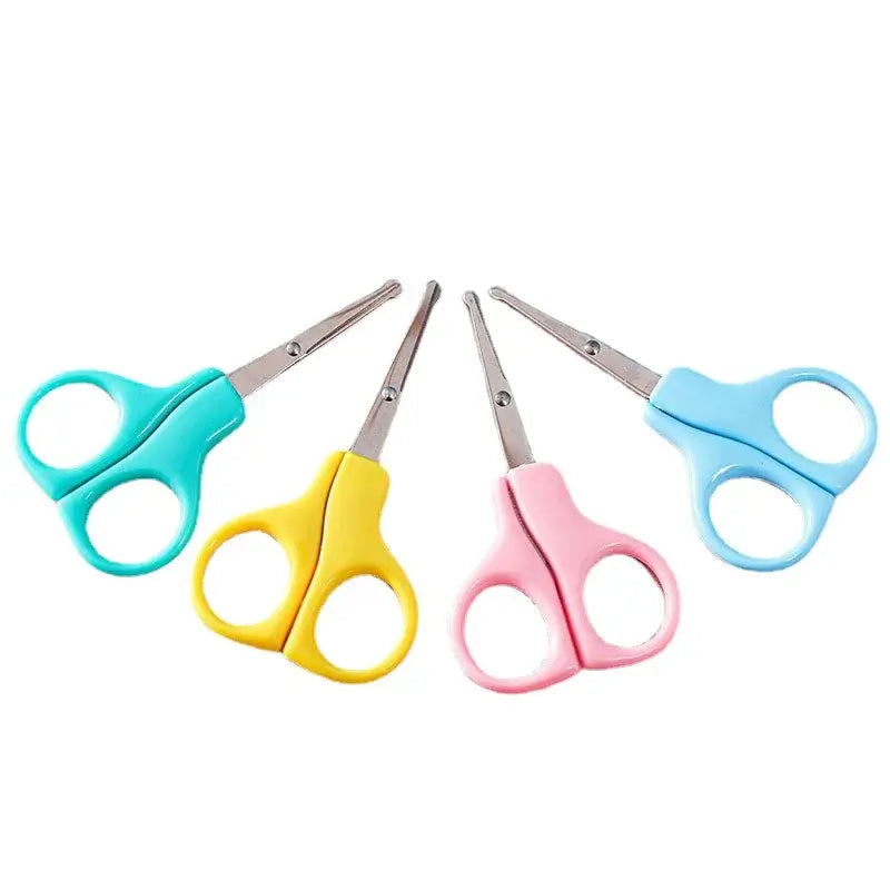 Colorful baby nail scissors in pink, yellow, blue, and green for safe grooming of newborns and toddlers.