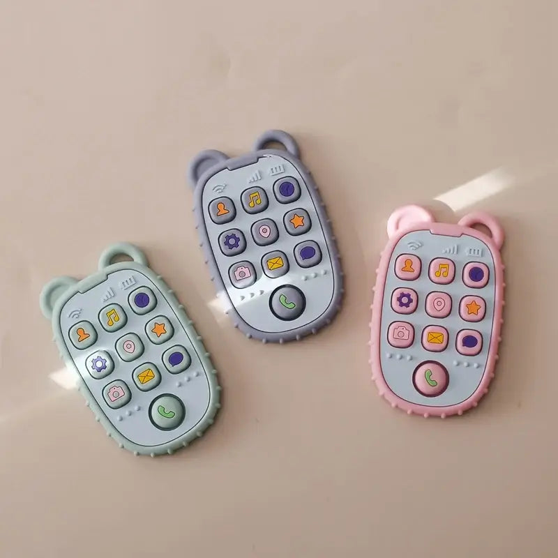 Colorful silicone baby toy phones in green, purple, and pink, designed for toddlers, featuring interactive buttons.