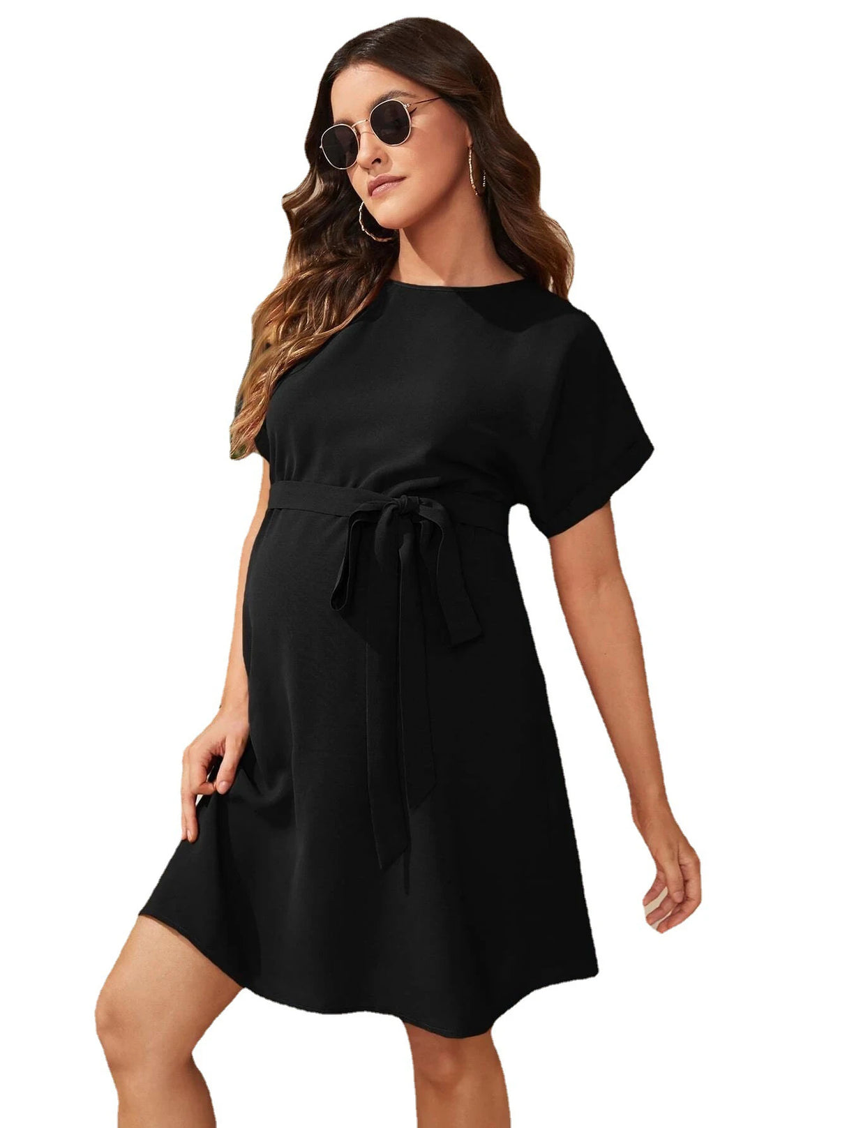 Bat-sleeve maternity tunic dress in black, featuring a boat neckline and tied waist, perfect for summer photo shoots.