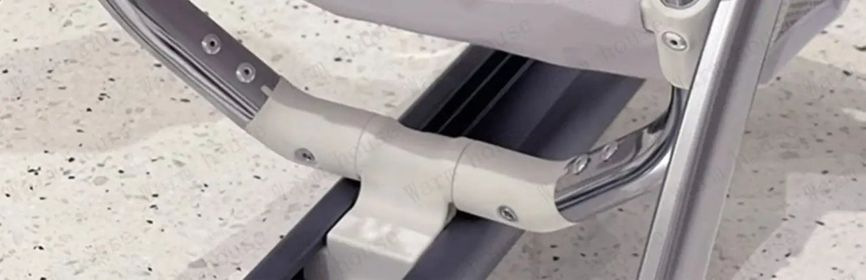 Close-up of the lightweight foldable stroller's aluminum frame and sturdy handle, designed for children's comfort.