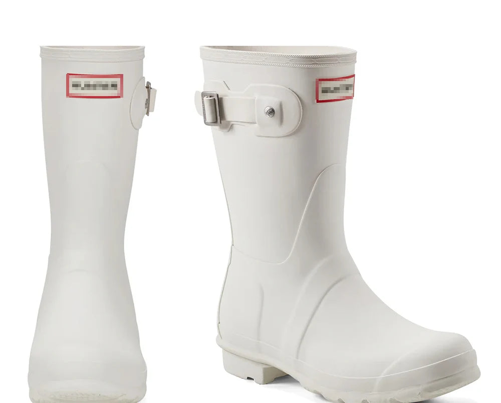 حذاء نسائي من الجلد المطرز حتى منتصف الساق