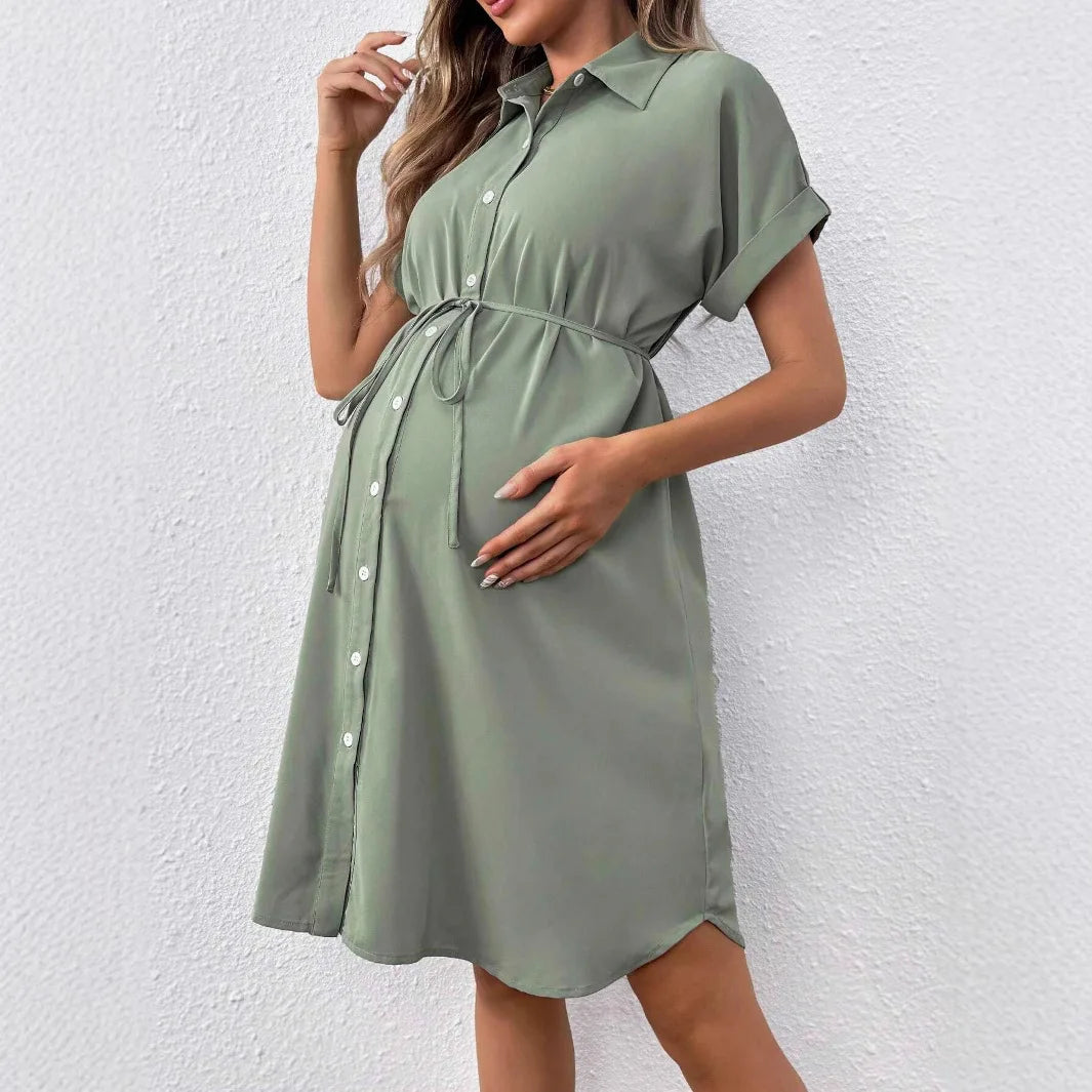 Casual summer striped button maternity dress in solid green, featuring a lapel collar and short sleeves for expectant mothers.
