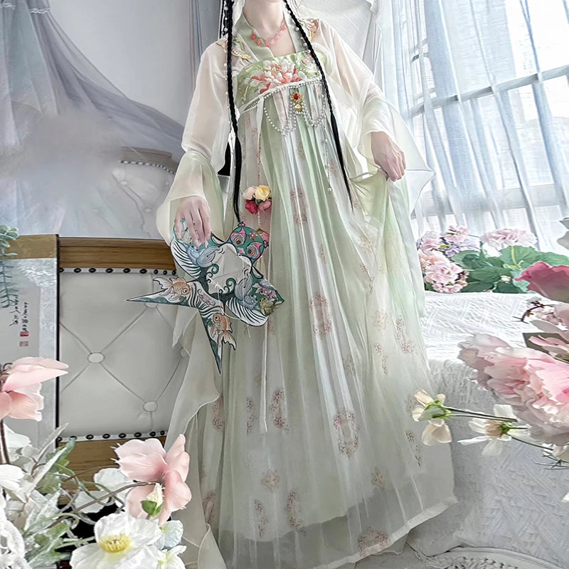 Vintage Chinese style Hanfu dress in light green with floral details, perfect for traditional clothing enthusiasts.