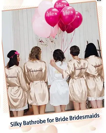 Silky bathrobes for bridesmaids and bride with balloons, perfect for wedding celebrations.
