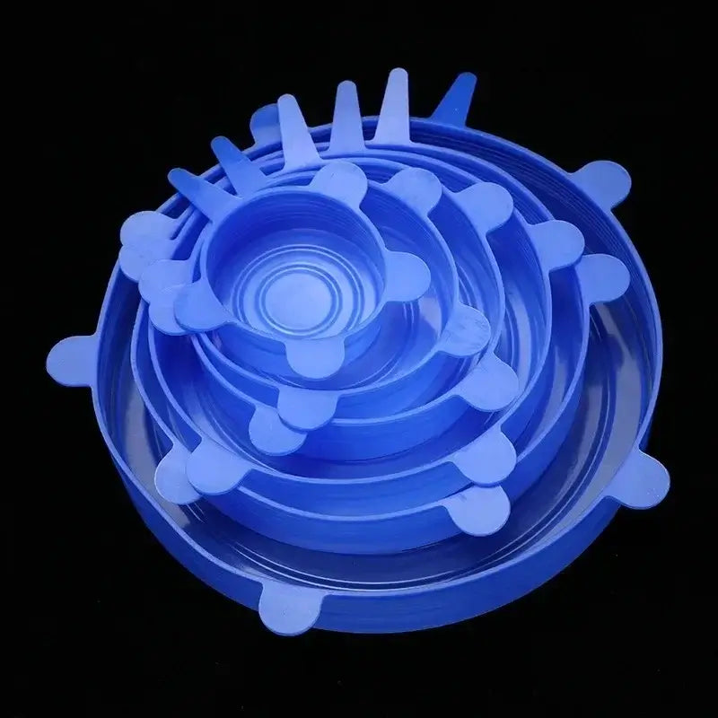 Set of blue adjustable silicone food covers in various sizes for airtight sealing.