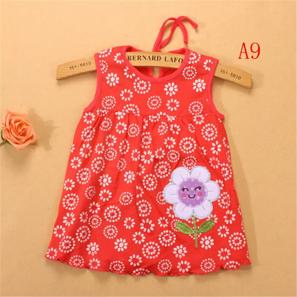 Newborn girls sleeveless cotton dress with floral pattern and cute flower graphic, ideal for summer wear.