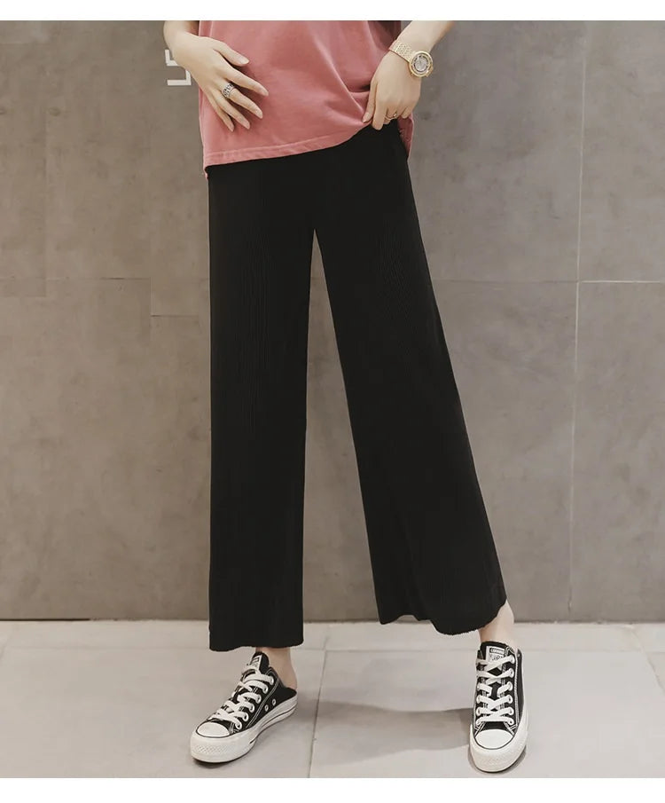 Breathable adjustable waist maternity wide leg pants in black, perfect for summer comfort and style.