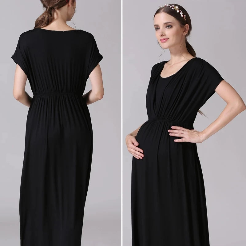 Soft fabric black maternity dress for nursing, featuring a comfortable and stylish design by Emotion Moms.