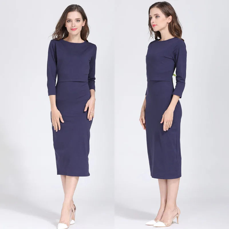 Postpartum nursing maternity dress with 3/4 sleeves, knee-length, in solid navy color, designed for breastfeeding women.