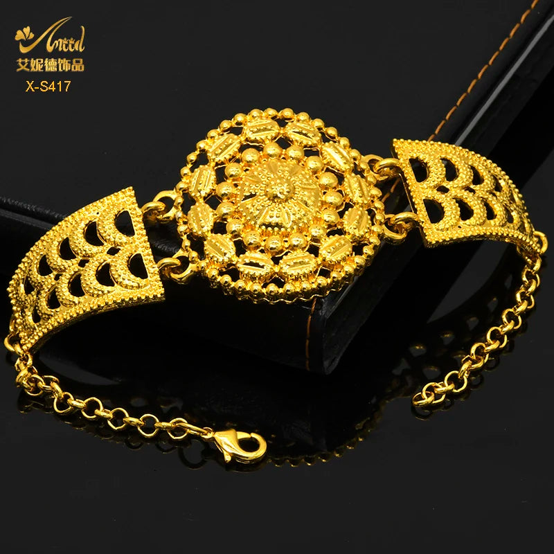 Luxury Indian bridal jewelry bracelet set in 24K gold plating, featuring intricate floral designs, perfect for weddings.
