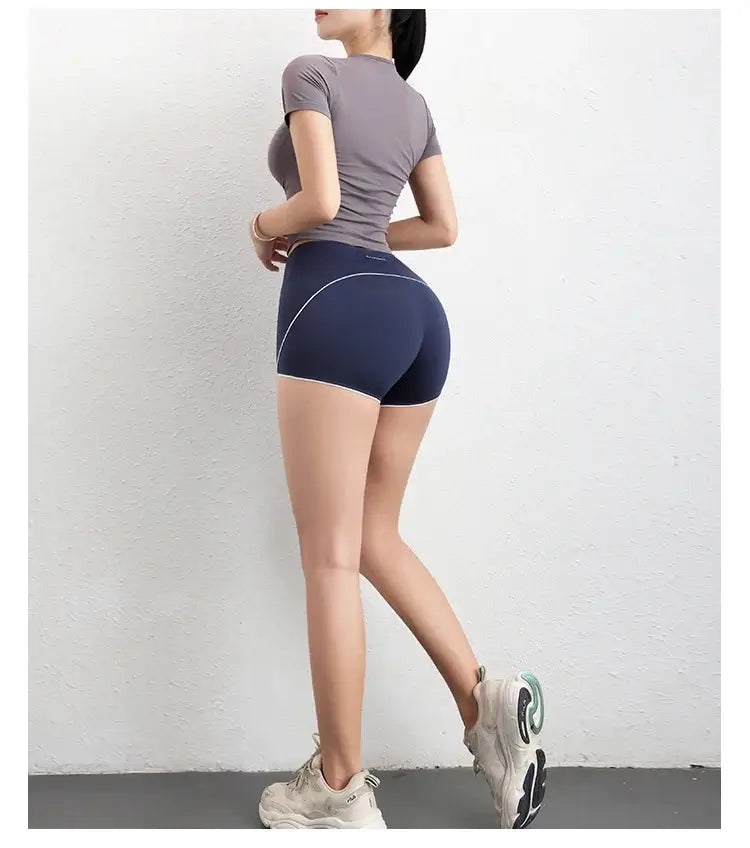 قميص رياضي نسائي ضاغط بأكمام قصيرة بدون درزات