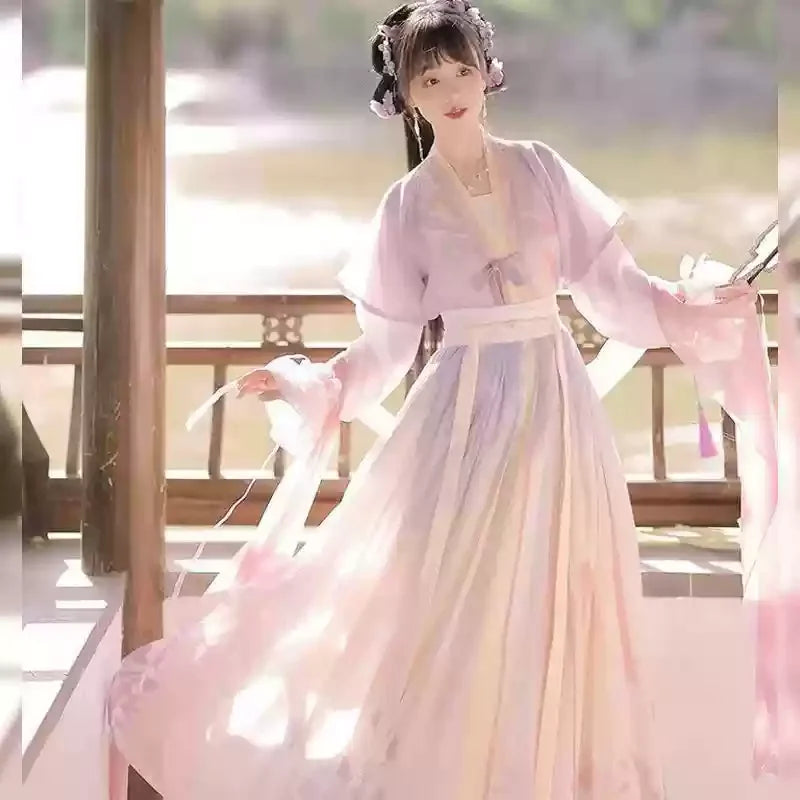 Elegant Hanfu traditional dress for women, featuring soft pastel colors, ideal for party outfits and special occasions.