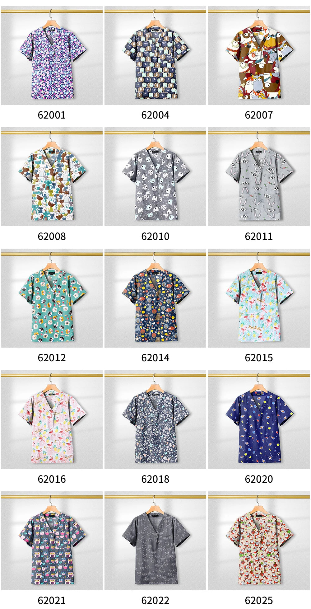 Variety of printed short sleeve nursing scrub tops hanging on display, featuring colorful designs and patterns.