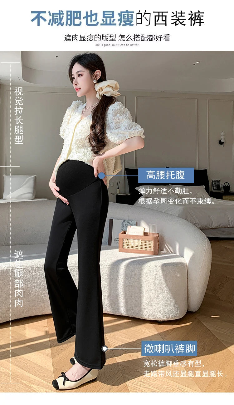 Stylish pregnant woman wearing Y2K bootcut maternity pants, showcasing chic summer fashion in black and cream.