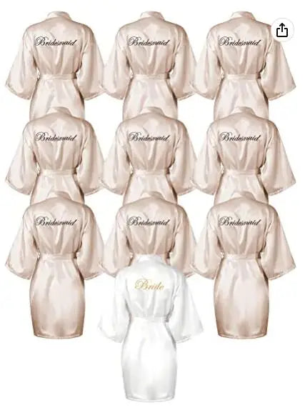 Set of silk robes for brides and bridesmaids featuring matching 'Bride' and 'Bridesmaid' designs in soft colors.