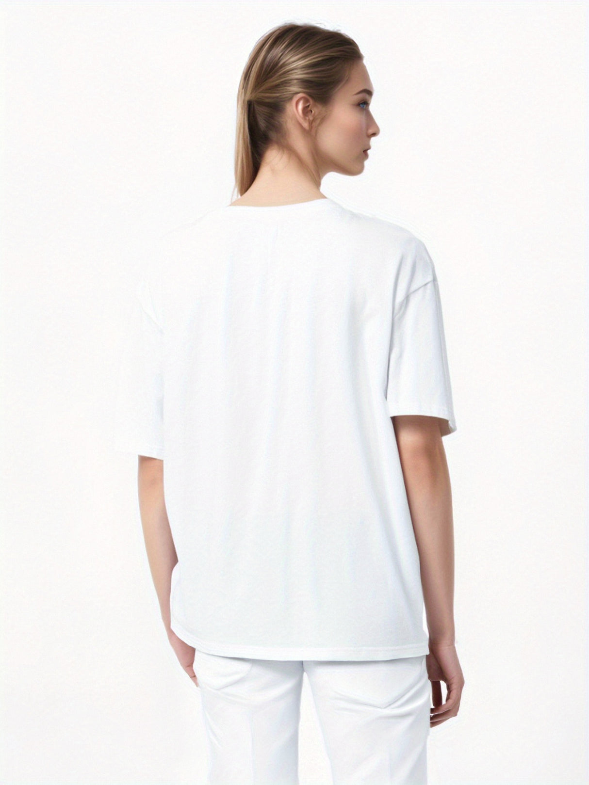 Back view of a woman wearing a white casual coffee print T-shirt, made of 100% cotton, showcasing a comfortable style.