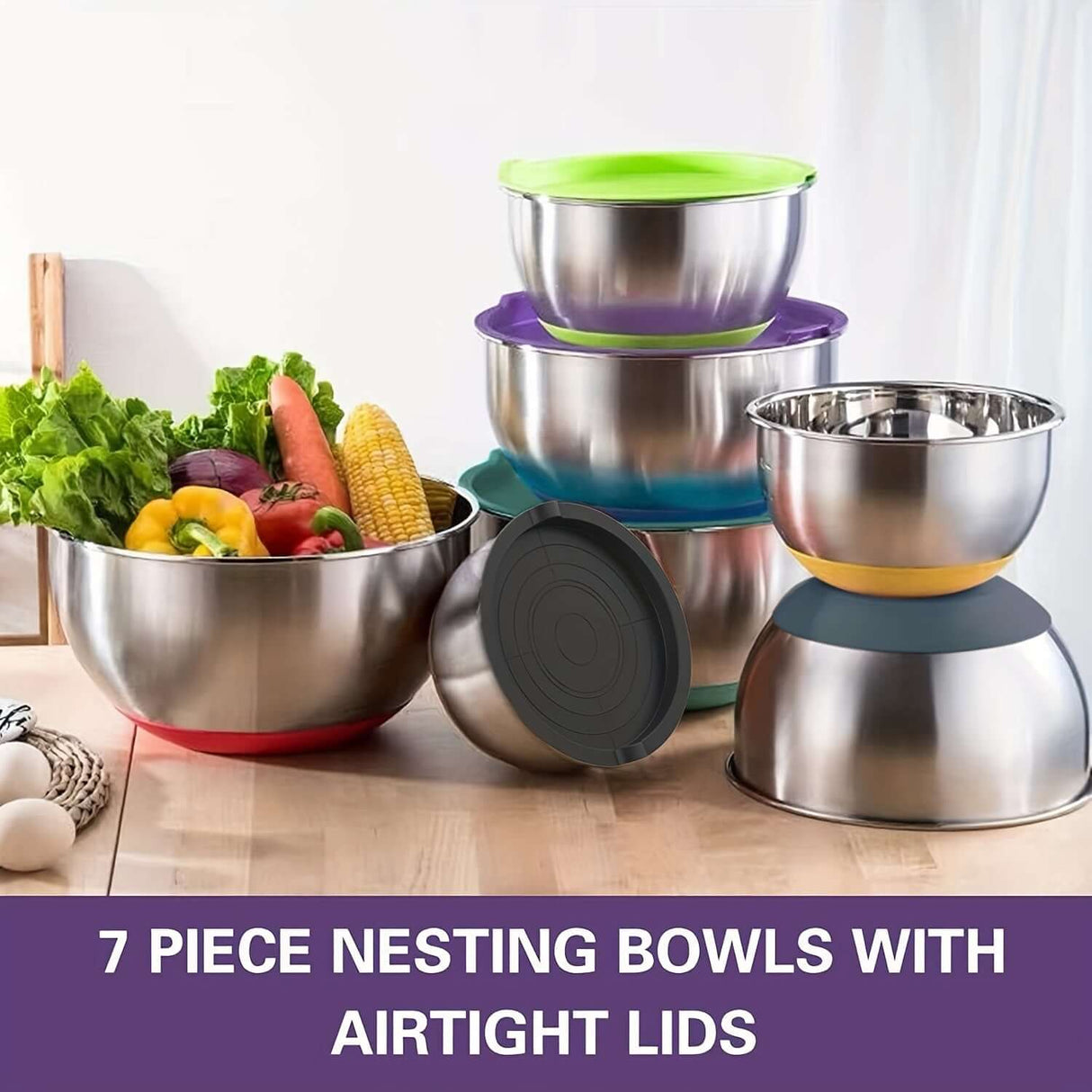 7-piece stainless steel nesting bowls set with airtight lids, colorful silicone bases, perfect for food storage and preparation.