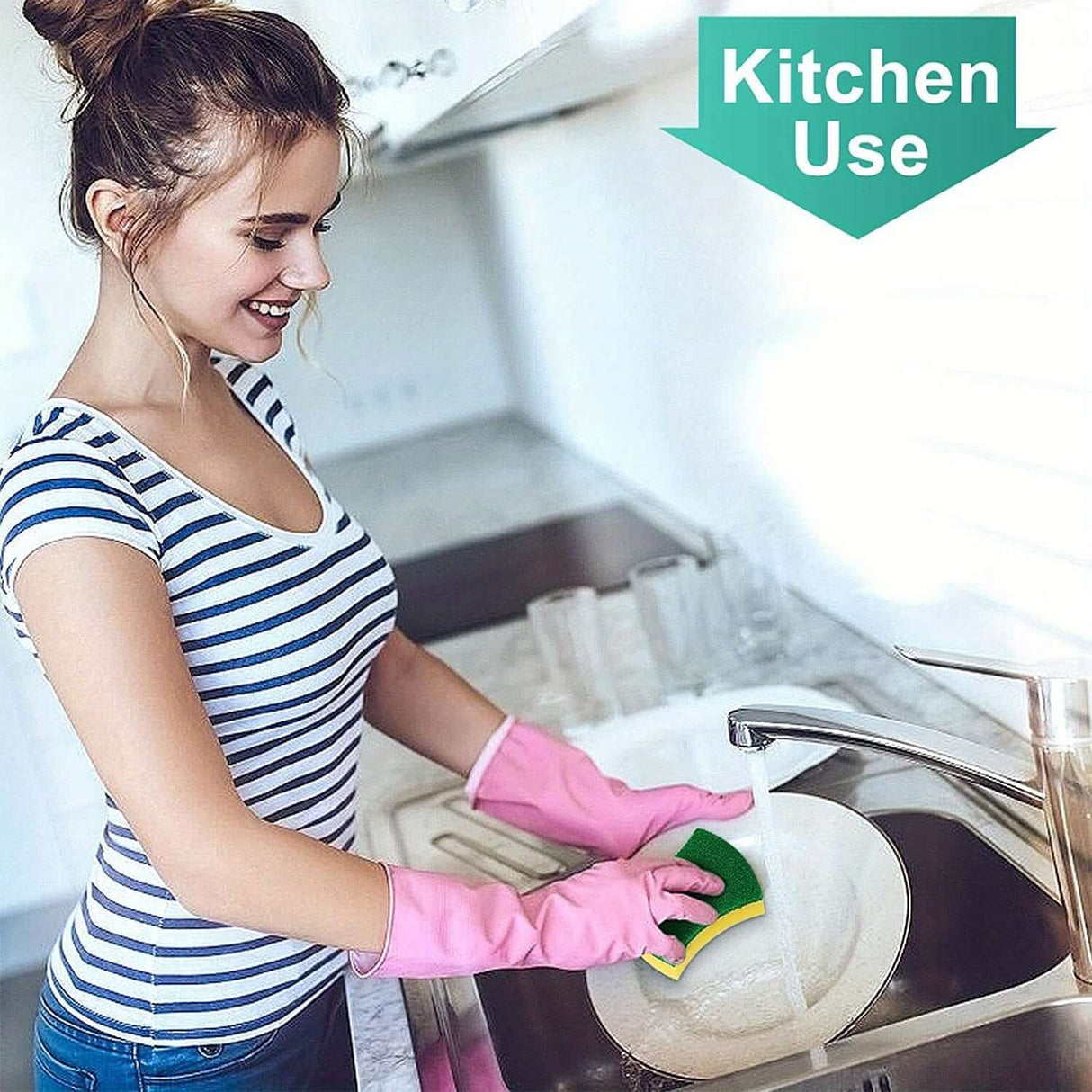 Woman using a multifunctional super absorbent cleaning sponge in the kitchen, wearing pink gloves.