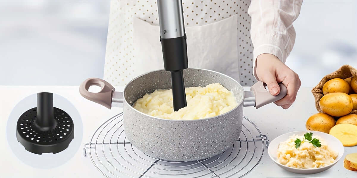 User blending mashed potatoes in a pot with an 8 in 1 immersion blender, featuring a heavy duty motor and multiple components.