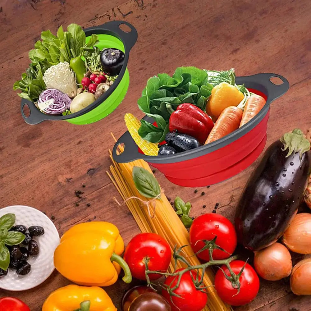 Eco-friendly silicone fruit and vegetable cleaning baskets in red and green, filled with fresh produce.
