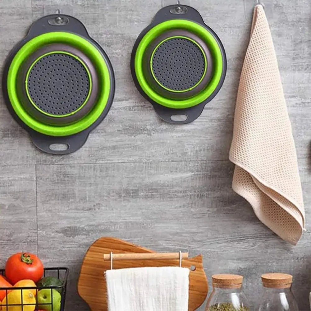 Silicone fruit and vegetable cleaning baskets in a kitchen, showcasing eco-friendly design and collapsible features.