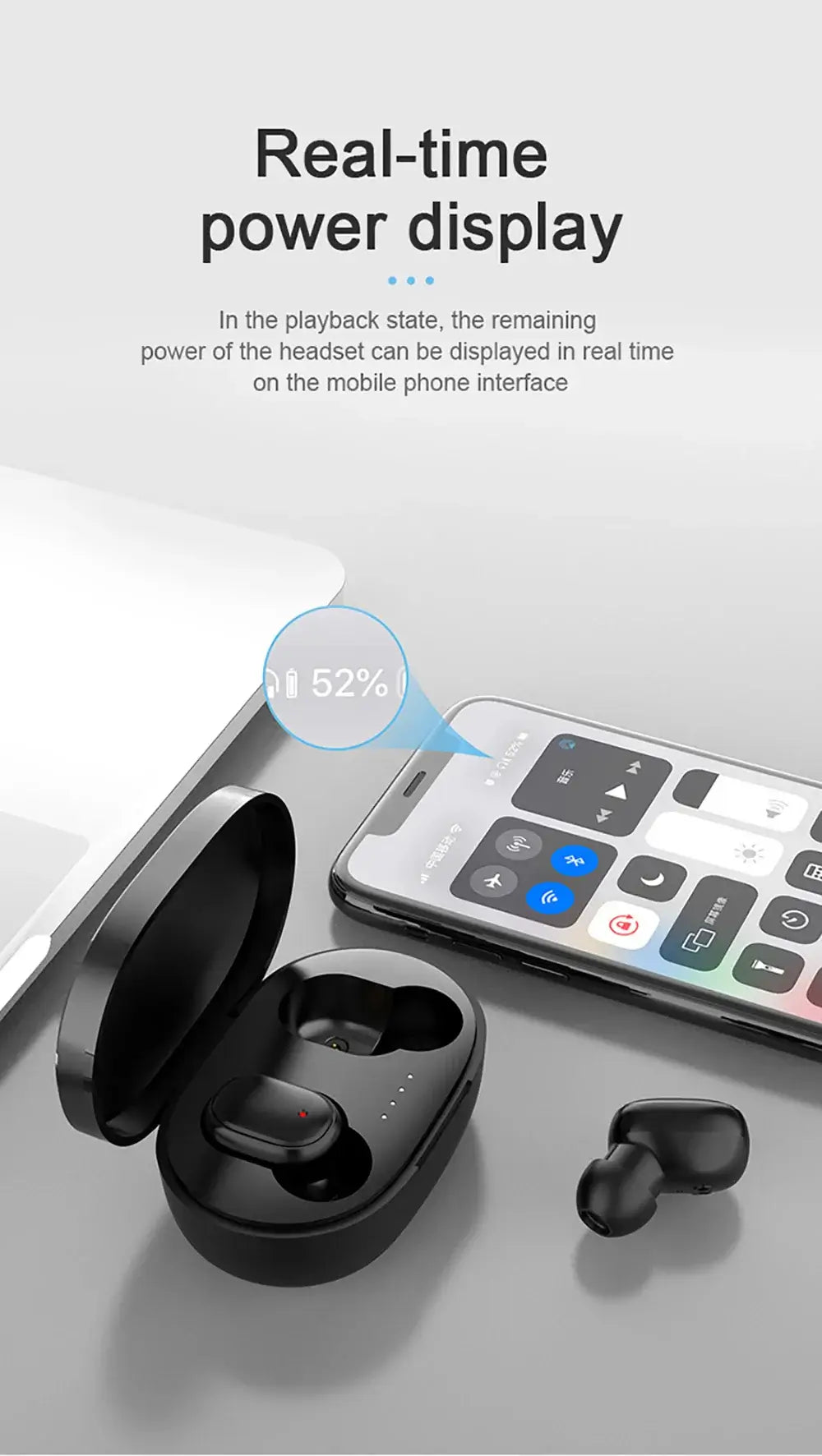 TWS A6S wireless Bluetooth earbuds with real-time power display next to a smartphone and laptop.