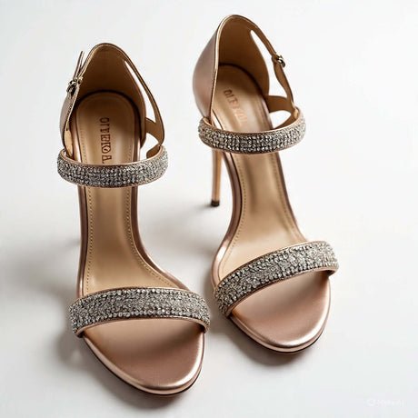 Elegant rose gold heeled sandals with glittering straps for women, perfect for formal or evening wear.