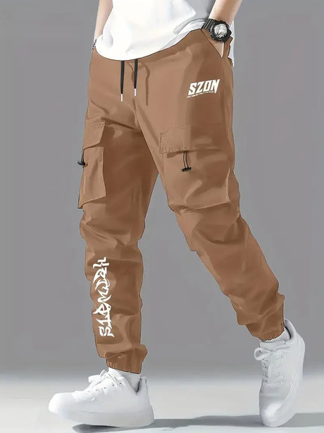 Men's brown cargo pants with pockets, stylish design, perfect for casual wear and street fashion.