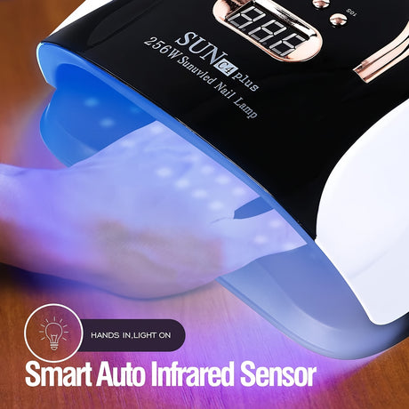 Digital display nail curing light with smart auto infrared sensor and hands under the lamp for UV curing.