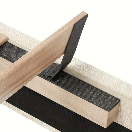 Close-up of bed frame component showcasing hardwood and modern design features with textured detail.