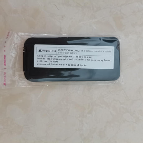 Warning label for button cell battery with safety instructions for safe disposal and ingestion hazard notice.
