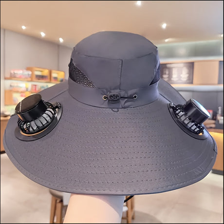 Solar dual fan anti-UV hat in grey, featuring two adjustable fans for cooling and protection from the sun.
