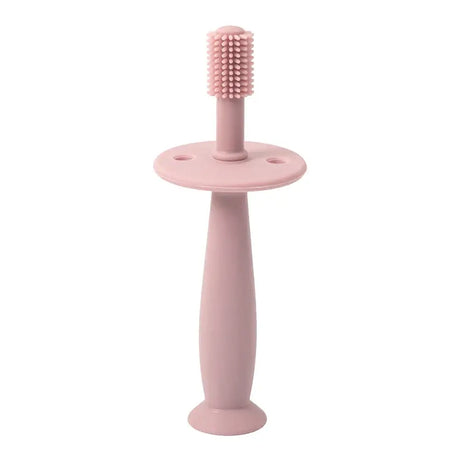 Baby soft silicone training toothbrush in pink design, perfect for infants aged 0-6 years to promote dental hygiene.