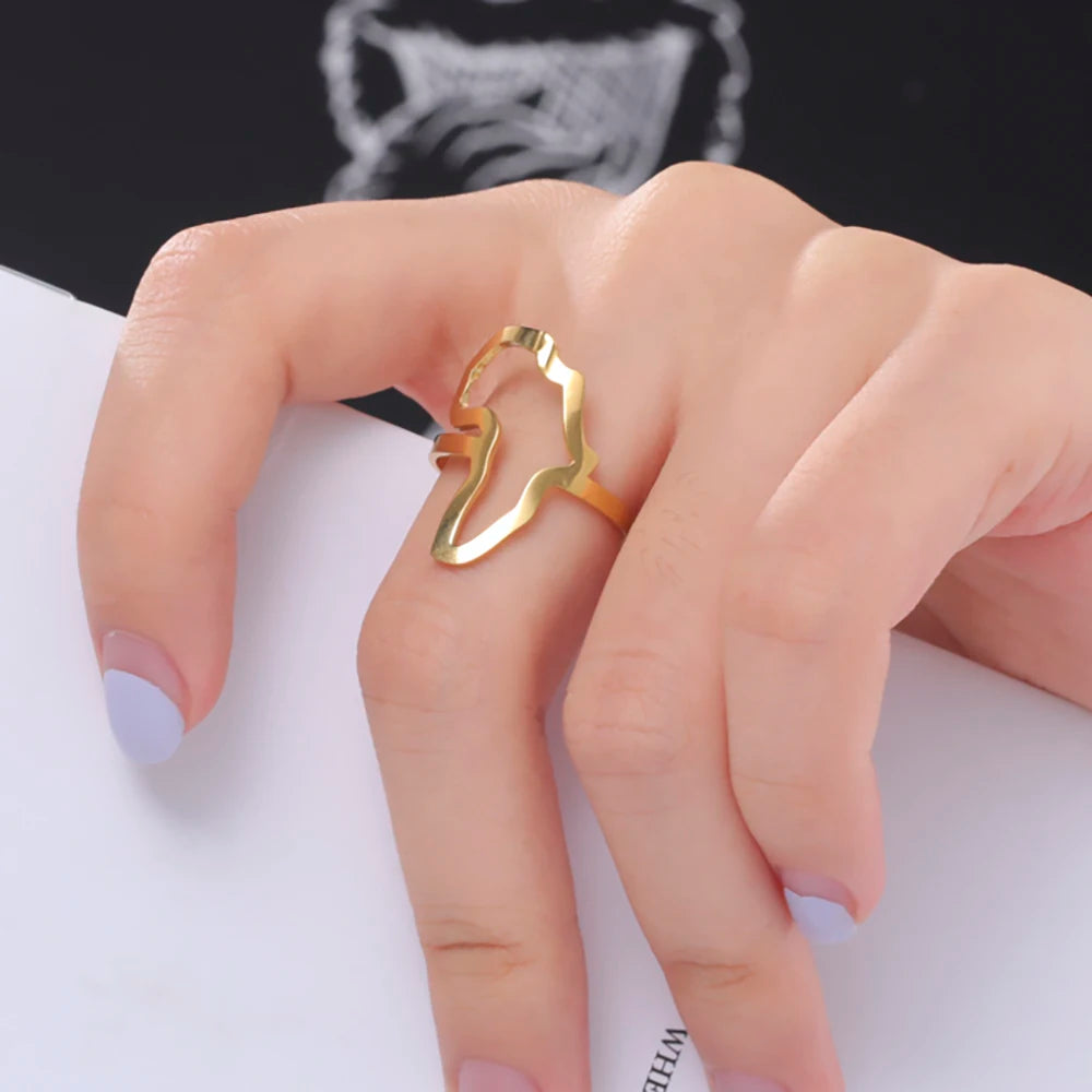 Stylish African map gold ring worn on a woman's finger, perfect for daily wear and gift giving.