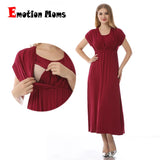 Soft fabric maternity nursing dress by Emotion Moms, featuring a v-neck and breastfeeding function, in burgundy color.