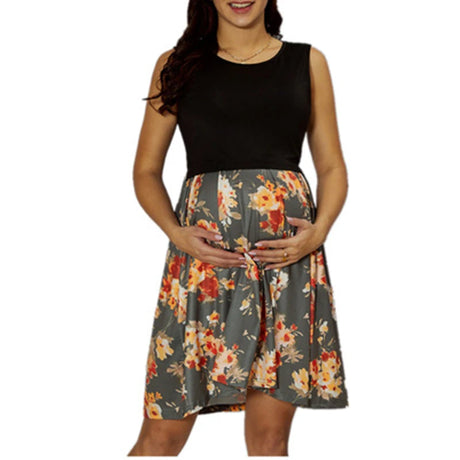 Contrast stitch sleeveless nursing dress with floral print, perfect for maternity wear during summer.