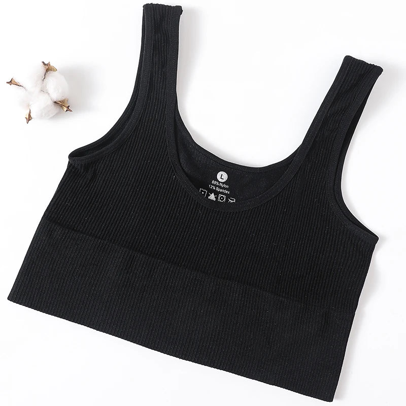 RibSculpt™ seamless ribbed camisole in black for women, wireless and fitness-ready, made with nylon and spandex.