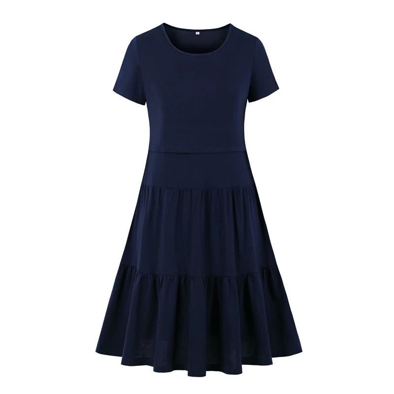 Navy blue knee-length pleated dress with short sleeves, perfect for casual summer outings.