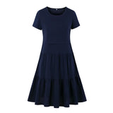 Navy blue knee-length pleated dress with short sleeves, perfect for casual summer outings.