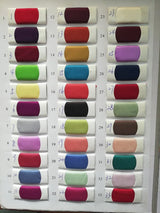 Color swatch chart featuring various fabric shades for design selection.