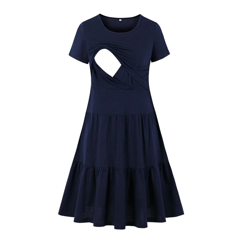 Navy blue sleeveless nursing dress with cutout design and flared skirt, perfect for summer maternity wear.