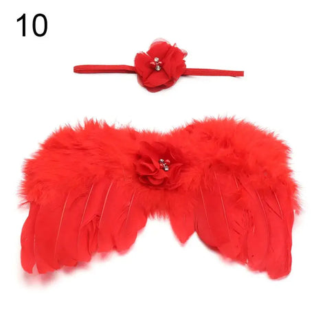 Cute newborn angel wings with red feathers and matching rose flower headband for baby girls.