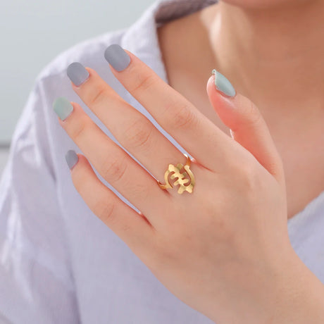 Elegant African map gold ring worn on a woman's hand with stylish nails, perfect for daily wear and women's jewelry.