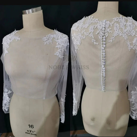 Lace bridal bolero featuring long sleeves and floral appliques, perfect for elegant wedding attire.