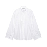 EmbroiChic™ elegant white embroidered long sleeve shirt for women, perfect for casual outings.