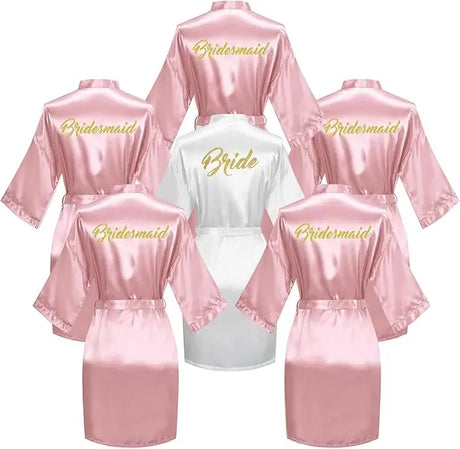 6-piece satin bridal shower robe set featuring 'Bride' and 'Bridesmaid' designs in pink and white.