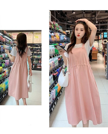 Korean loose fit maternity dress in pink, ideal for holiday photography, showcasing a stylish casual look