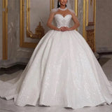 Sparkle African wedding ball gown with glitter beads, lace-up back, and floor-length design in white.